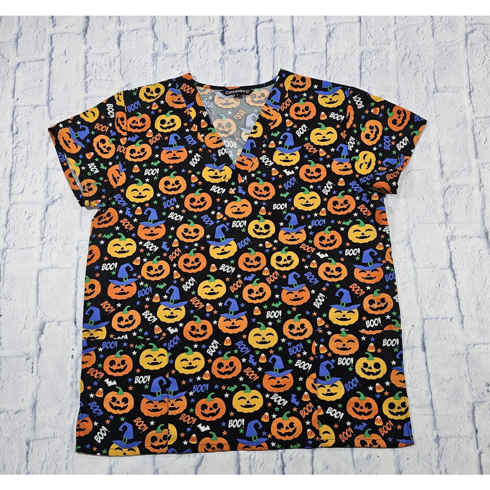 Cassandra O WOMENS L Scrub Top Halloween Jack O Lanterns Pumpkins Black Orange